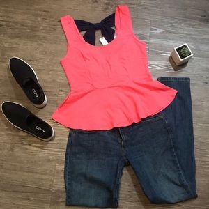 Peplum tank with bow back